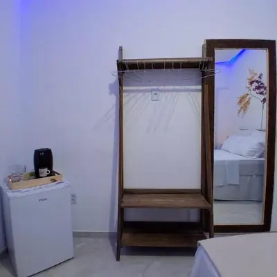 Uma cama ou camas num quarto em Preá, Suíte Privativa próximo ao Parque Nacional de Jeri