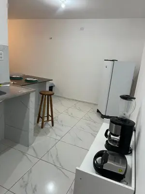 A cozinha ou kitchenette de Apartamento da Kenia