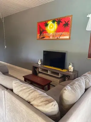 Uma televisão e/ou sistema de entretenimento em Casa em Moitas