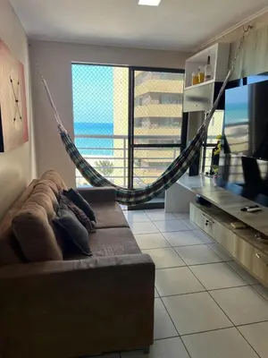 Uma área de estar em Apartamento 2 quartos vista mar praia de iracema mobiliado