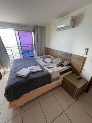 Uma cama ou camas num quarto em Ap maravilhoso vista mar na melhor região de Fortaleza