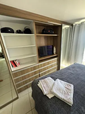 Uma cama ou camas num quarto em Ap maravilhoso vista mar na melhor região de Fortaleza