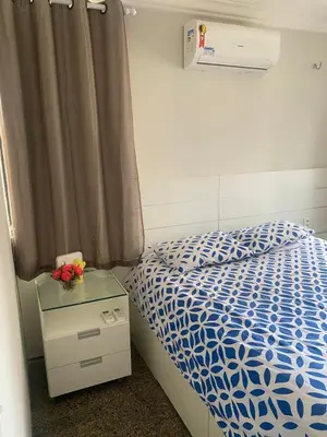 Uma cama ou camas num quarto em Apartment with sea view on Iracema Beach