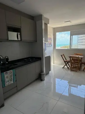 A cozinha ou kitchenette de Apê Pé na Areia com Vista Mar Ar-condicionado & Garagem