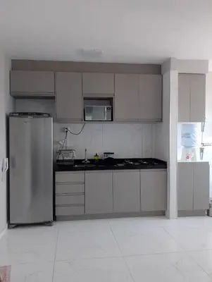 A cozinha ou kitchenette de Apê Pé na Areia com Vista Mar Ar-condicionado & Garagem
