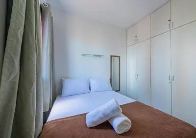 Uma cama ou camas num quarto em Hamilton #1203 - Apto em Meirelles by Carpediem