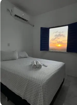Uma cama ou camas num quarto em Apartamento da Kenia