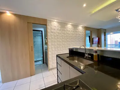 A cozinha ou kitchenette de APARTAMENTO 17º Andar Beira Mar com 2 QUARTOS