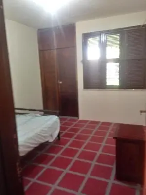 Uma cama ou camas num quarto em Maravilhosa Casa de Praia em Morro Branco