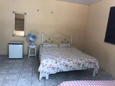 Uma cama ou camas num quarto em Maravilhosa Casa de Praia em Morro Branco