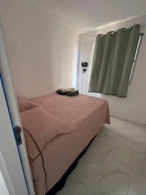 Uma cama ou camas num quarto em Rômulo Barbosa