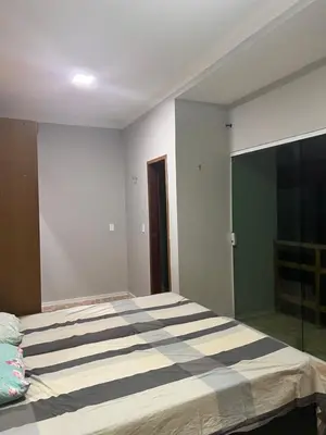 Uma cama ou camas num quarto em Aconchego Paracuru
