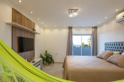 Uma televisão e/ou sistema de entretenimento em Casa Porpora Cumbuco