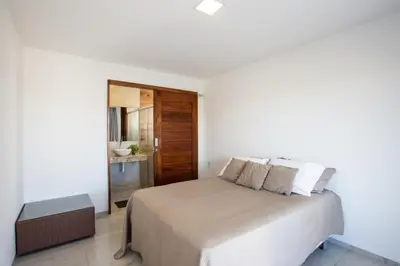 Uma cama ou camas num quarto em Casa Porpora Cumbuco