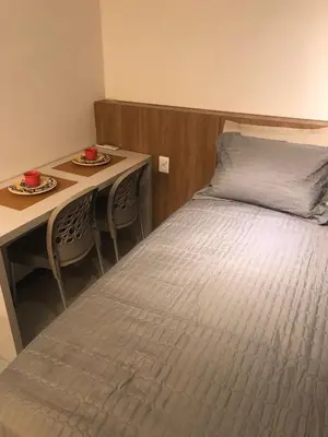 Uma cama ou camas num quarto em Beach Class Fortaleza By Studio Brook