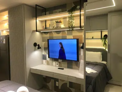 Uma televisão e/ou sistema de entretenimento em Studio Safira no Meireles próximo à Praia de Iracema