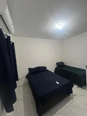 Uma cama ou camas num quarto em Ap Jn