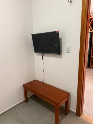 Uma televisão e/ou sistema de entretenimento em Casa Charm Park Prea