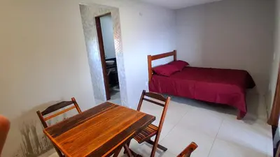 Uma cama ou camas num quarto em Chalé Lá Aurora