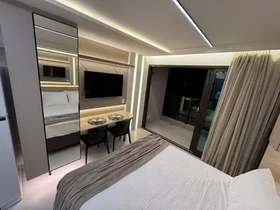 Uma cama ou camas num quarto em Flat Beach Class 600m from the beach Fortaleza praia