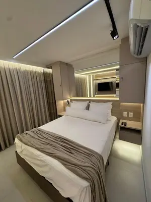 Uma cama ou camas num quarto em Flat Beach Class 600m from the beach Fortaleza praia