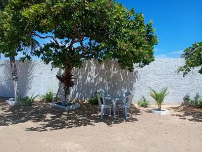 Um jardim no exterior de Hostel Mamitchesca - Redes e Barracas