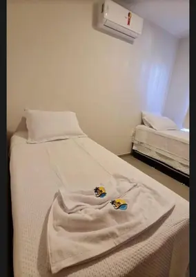Uma cama ou camas num quarto em Boas vindas