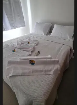 Uma cama ou camas num quarto em Boas vindas