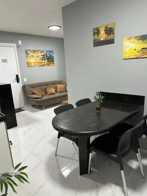 Uma área de estar em Ap Praia do Futuro - Fortaleza, pé na areia