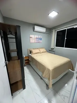 Uma cama ou camas num quarto em Ap Praia do Futuro - Fortaleza, pé na areia