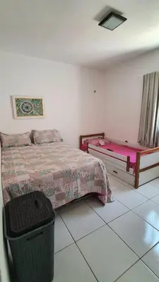 Uma cama ou camas num quarto em Casa em Paracuru a 5 min da praia