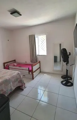 Uma cama ou camas num quarto em Casa em Paracuru a 5 min da praia