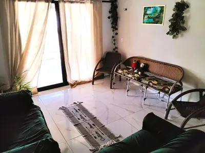 Uma área de estar em Casa Do Canto Verde