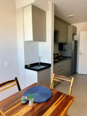 A cozinha ou kitchenette de Apartamento novo, com vista para o mar e pé na areia!