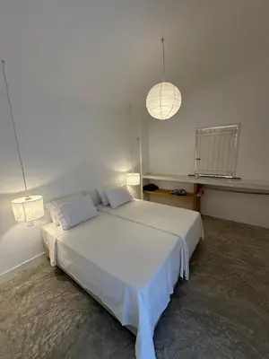 Uma cama ou camas num quarto em Casa Emboá Kite house in Praia da Emboaca!