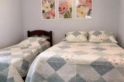 Uma cama ou camas num quarto em Sítio casa das fadas em Pacoti