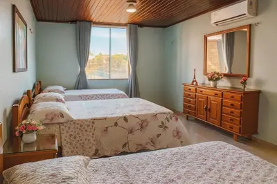 Uma cama ou camas num quarto em Casa de praia Porto das dunas
