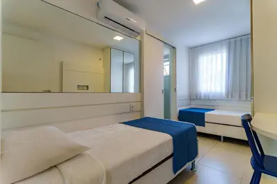 Uma cama ou camas num quarto em Apartamento Golf Ville - Beach Park