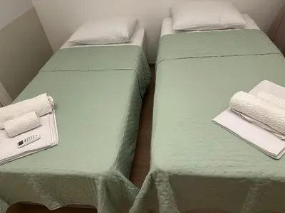 Uma cama ou camas num quarto em Mirante Condominio Clube