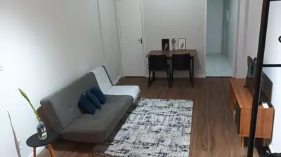 Uma área de estar em Flat Aconchego Beira Mar