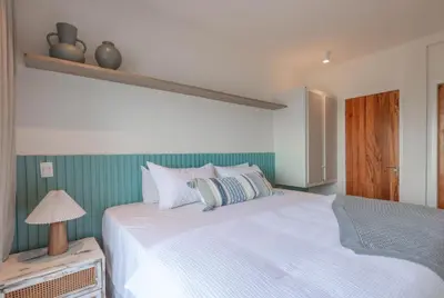 Uma cama ou camas num quarto em Apt 402 Penthouse Cumbuco