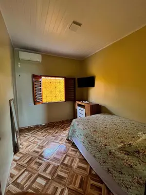 Uma cama ou camas num quarto em Casa Barra da Sucatinga-Beberibe