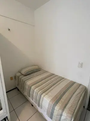 Uma cama ou camas num quarto em Apartamento Familiar