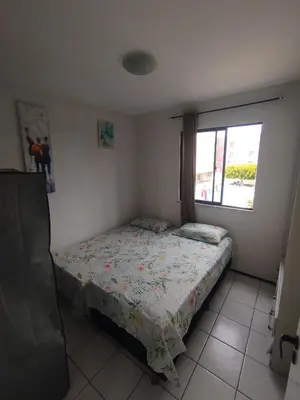 Uma cama ou camas num quarto em Cumbuco Geek House