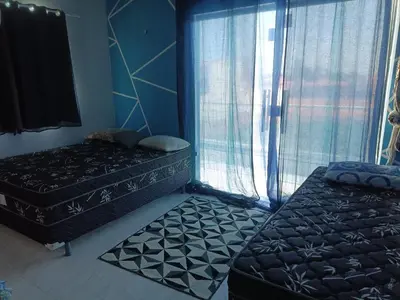 Uma cama ou camas num quarto em Casa com 2 quartos