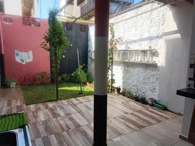 Um jardim no exterior de Casa com 2 quartos