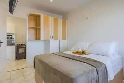 A cozinha ou kitchenette de Studio no Porto das Dunas vista mar e Beach Park!