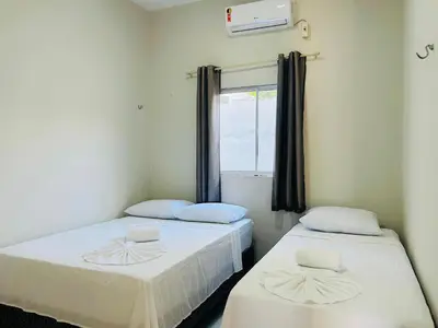 Uma cama ou camas num quarto em Serena Jeri Flats