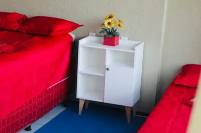 Uma cama ou camas num quarto em Casa da mãe Joana