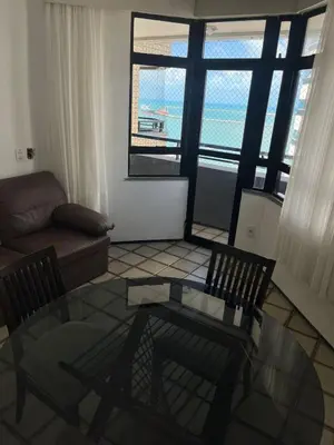 Uma área de estar em Golden Fortaleza Hotel 1 quarto